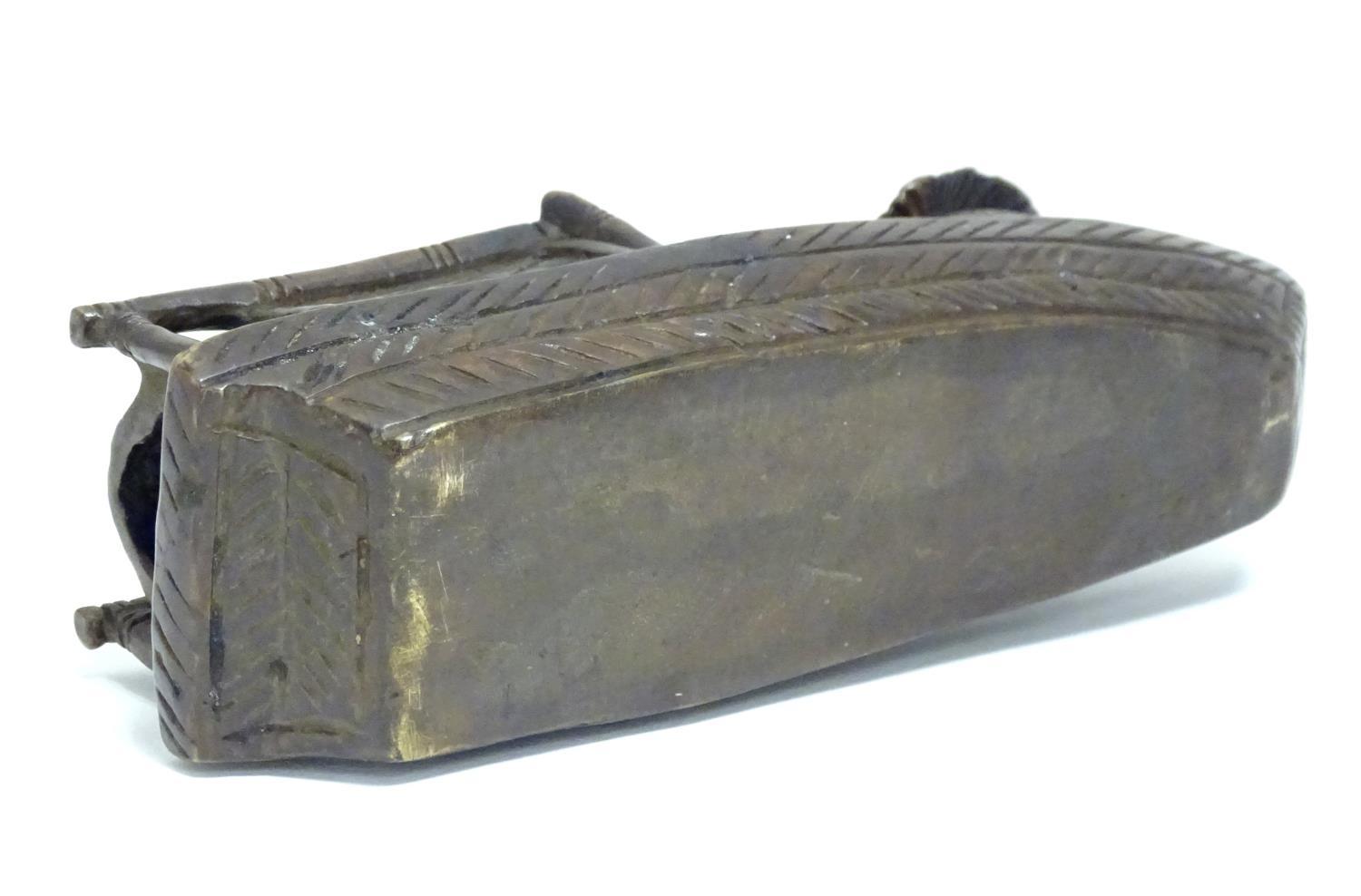 An Oriental bronze model of a fishing boat with a figure fishing. Approx. 6 1/2" long Please - Image 7 of 7