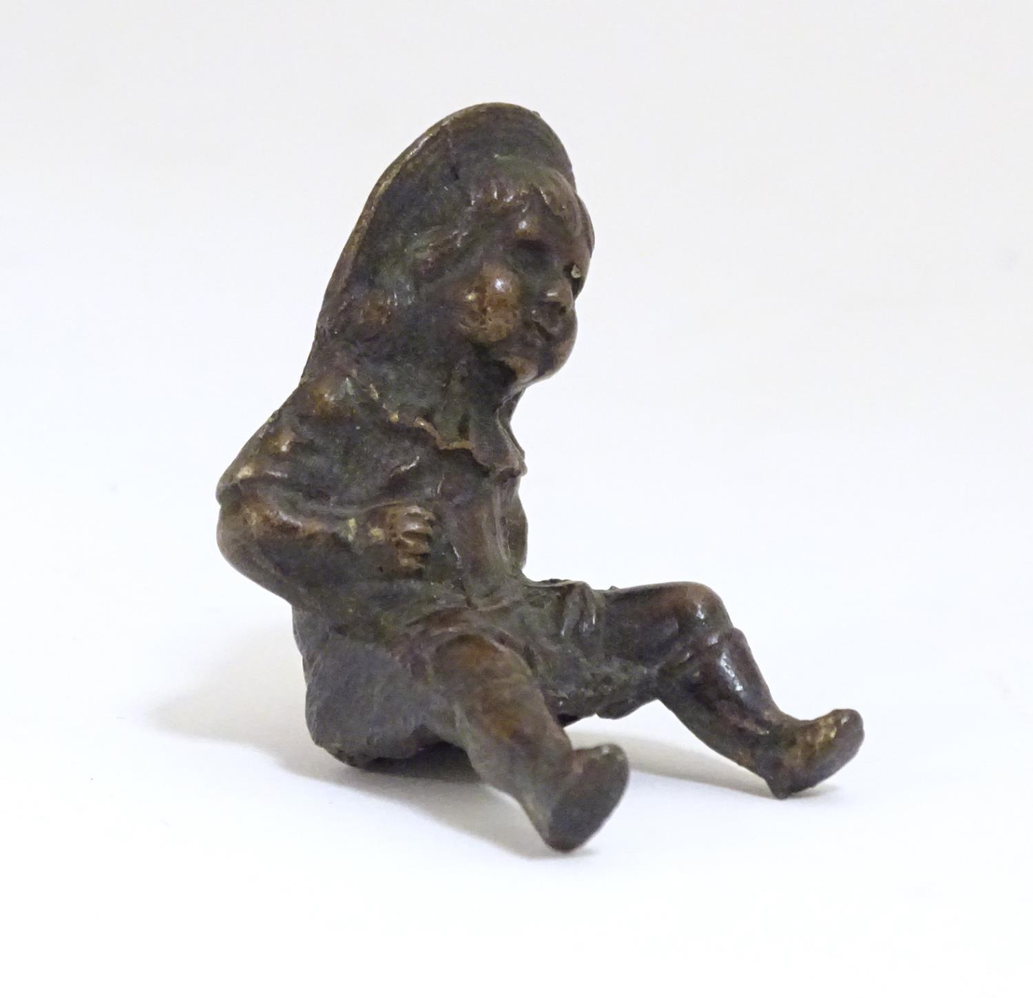 A late 19thC bronze modelled as a young girl with a hat. Approx. 2" Please Note - we do not make - Image 3 of 5