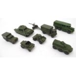 Toys: A quantity of Dinky Toys die cast scale model military vehicles comprising Dinky Supertoys