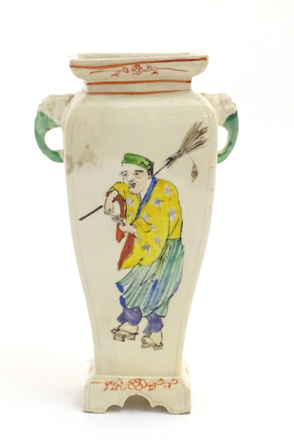 An Oriental vase with twin handles of elephant head form. The body with hand painted figures and - Image 3 of 7