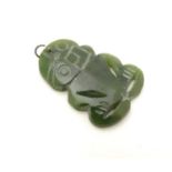 A New Zealand Nephrite Greenstone Jade Tiki style pendant . Approx 1 /4" long Please Note - we do