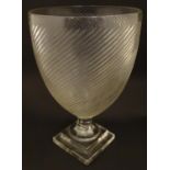 A 19thC pedestal glass vase on stepped base 12" high Please Note - we do not make reference to the