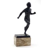 A 20thC cast model of a man running on a marble base. Approx. 10 3/4" high overall Please Note -