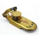 A Jugendstil brass inkwell / standish with floral copper inlay and pierced detail. Stamped under.