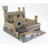 Toy: An early 20thC hand painted scratch built wooden fort with a drawbridge, and crenelated