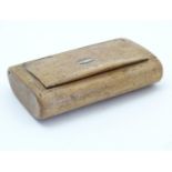 A 19thC birch wood treen snuff box of rectangular form with a hinged lid. Approx. 3 1/4" long Please