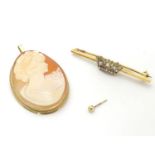 Items of 9ct gold to include a 9ct pendant / brooch set with shell carved cameo and a 9ct gold bar