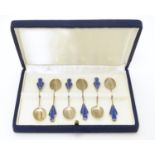 A set of 6 Continental white metal teaspoons with Art Deco lapis lazuli decoration to handles.