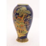 A Wiltshaw and Robinson Carlton Ware baluster vase decorated with a landscape scene with pagodas,