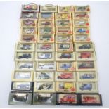 Toys: A quantity of boxed die cast scale model cars / vehicles, to include Lledo Promotional Models,