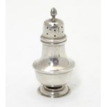 A silver pepperette hallmarked Birmingham 1912 maker George Nathan & Ridley Hayes 2 3/4" high Please