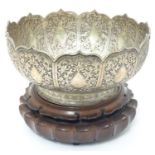A silver plate pedestal bowl with acanthus scroll detail on a carved hardwood stand. possibly