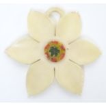 A late 19th / early 20thC carved pendant of flower form. Approx. 2" wide Please Note - we do not