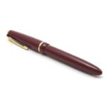 A boxed Parker Slimfold JGTM fountain pen with red finish and 14K gold nib Please Note - we do not