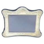 A photograph frame with silver surround hallmarked London 2001 maker Kitney & Co (Gordon &