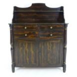 An early / mid 19thC simulated rosewood chiffonier with a shaped upstand and a single shelf. The
