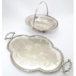 A silver plate tray the border and twin handles of naturalistic branch form. Together with a