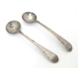 A Pair of Geo III silver salt spoons with bright cut decoration. Hallmarked London 1790 maker George
