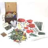 Toys: A quantity of Meccano, to include, wheels, nuts, bolts, screws, washers, axles, plates, gears,