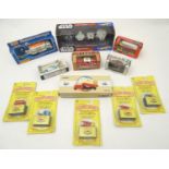 Toys: A quantity of assorted boxed die cast and plastic scale model cars / vehicles, comprising