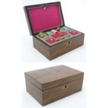 A 19thC walnut sewing box with inlaid parquetry detail to top. The fitted interior with lift out