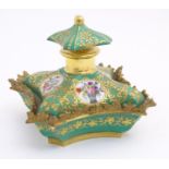 A 19thC Continental dressing table scent bottle / perfume flask with a green ground and gilt