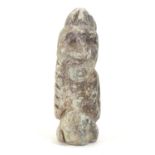 A soapstone carving modelled as a stylised crouching figure. Approx. 5" high Please Note - we do not