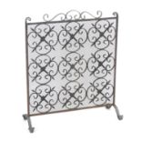 A late 19th / early 20thC wrought iron spark guard / fire screen. Approx. 28 1/4" x 23 1/4" Please