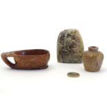 Three Oriental soapstone carvings to include a libation cup with floral detail, a small proportion