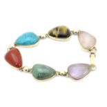 A 9ct gold bracelet set with various hardstone cabochon including rose quartz, turquoise, tigers eye