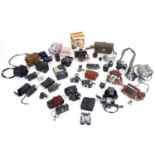 A large collection of vintage 20thC film and cinefilm cameras, including Polaroid, Pentax and