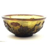 A Chinese Peking glass bowl with relief detail depicting auspicious symbols such as scrolls, flowers