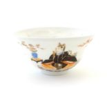 A Japanese small bowl depicting seated figures, a male figure in robes to one side, and a female