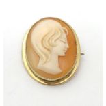A 9ct gold cameo brooch 1" high Please Note - we do not make reference to the condition of lots