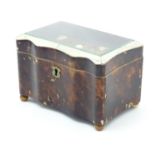 A 19thC tortoiseshell and faux tortoiseshell box / caddy of shaped form with a hinged glass topped