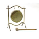 An early 20thC brass table dinner gong with beater. Approx. 11" high. Please Note - we do not make