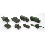 Toys: A quantity of Dinky Toys die cast scale model military vehicles comprising Dinky Supertoys