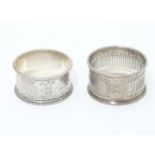 Two silver napkin rings one hallmarked Birmingham 1956 maker William Suckling Ltd the other