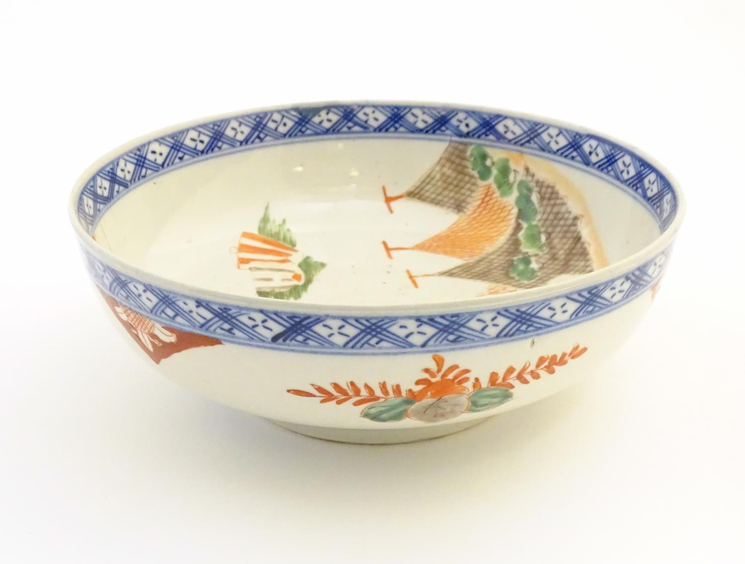 A Japanese bowl with hand painted decoration depicting a landscape scene with flowers, a crane - Image 5 of 7