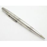 A Sterling silver ' Life Long' propelling pencil with engine turned decoration Approx 4 3/4" long