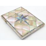 A Victorian mother of pearl card case with abalone star detail. Approx. 4" x 3" Please Note - we