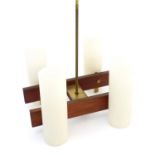 A vintage retro Danish pendant light fitting with four cylindrical shades in the style of Jo