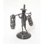A small Sterling silver model of an Oriental figure 2 1/2" high. Please Note - we do not make