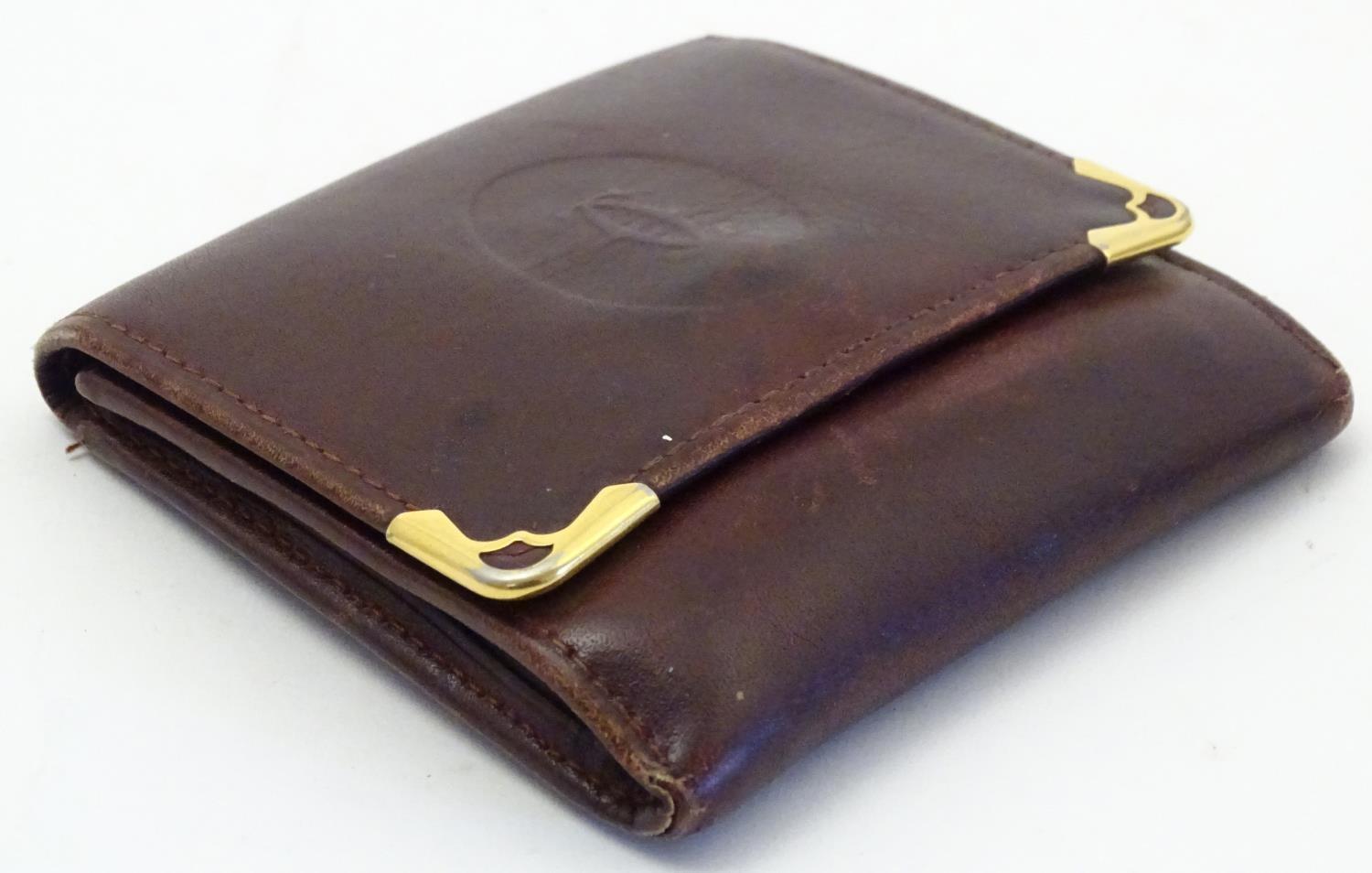 A Cartier small leather wallet / coin purse. Approx. 3 1/4" Please Note - we do not make reference - Image 6 of 6