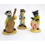 Three Beswick models from the Cats Chorus series, comprising Catwalking Bass, model no. CC 6, One