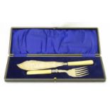 A Cased set of silver plate fish servers with ivorine handles and silver collars hallmarked