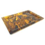 A vintage faux tortoiseshell lucite / acrylic serving tray of rectangular form. Approx. 15 1/4" x