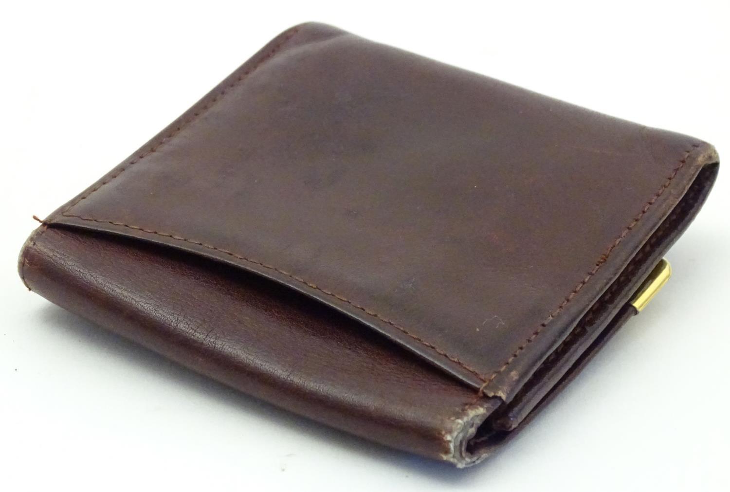 A Cartier small leather wallet / coin purse. Approx. 3 1/4" Please Note - we do not make reference - Image 2 of 6