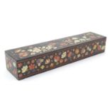 A 19thC wooden pencil box with hand painted polychrome flower and foliate decoration with gilt