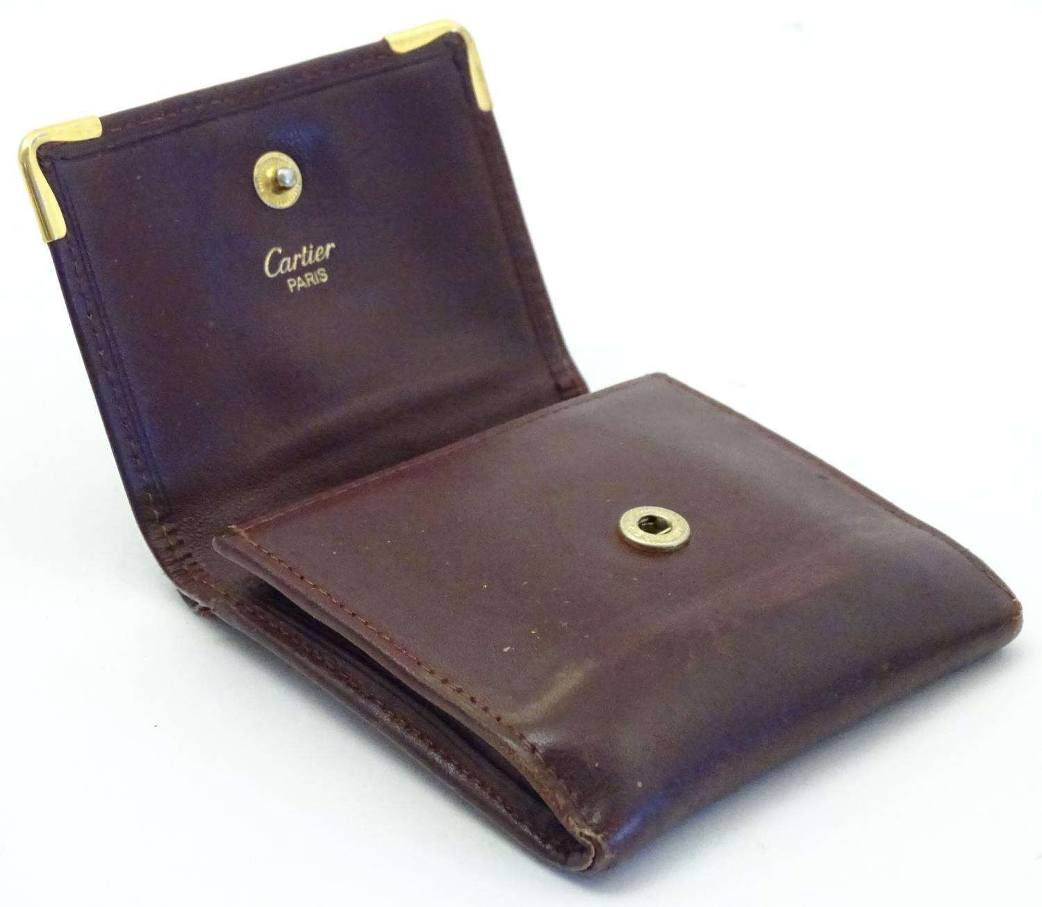 A Cartier small leather wallet / coin purse. Approx. 3 1/4" Please Note - we do not make reference - Image 3 of 6